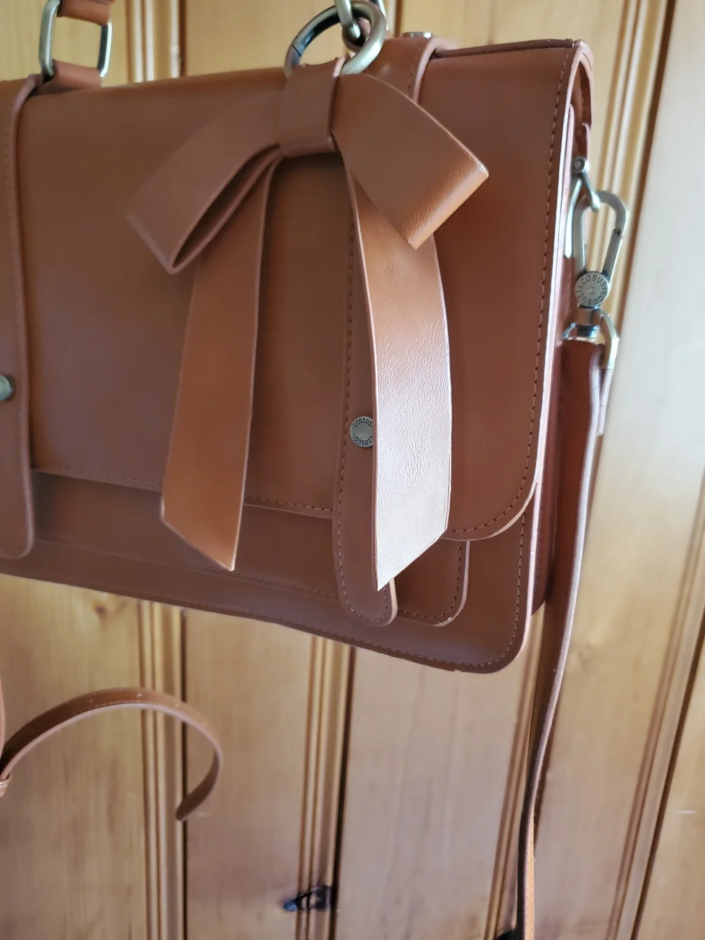 Classic Tan Satchel Handbag with Bow Accent